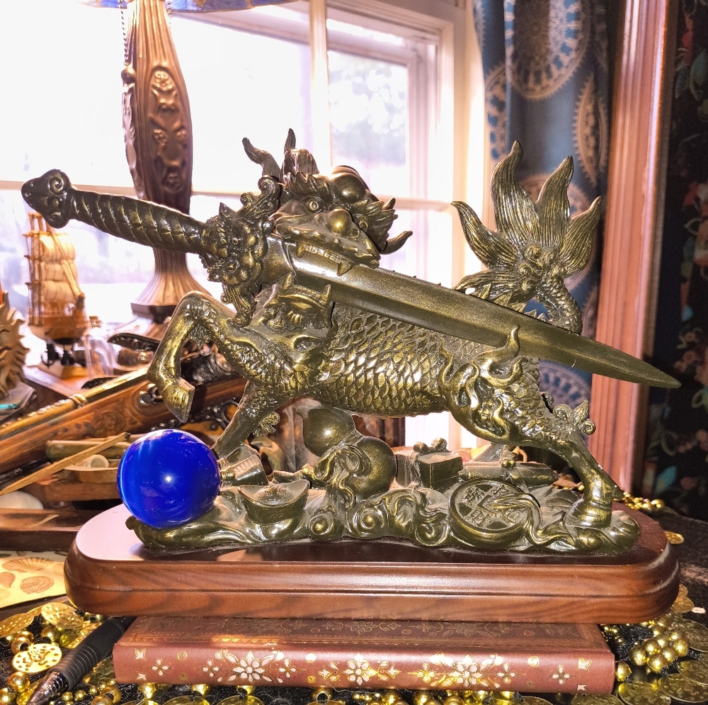 1990's Spencers Resin Chinese Dragon Statue with Blue Stone Orb